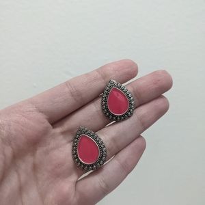 Bright pink ethnic studs